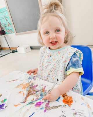 Our toddlers LOVE to paint! In the Montessori classroom we encourage exploration. We favor process over product. This means your child gets to paint what they choose, while developing hand-eye coordination, finger and hand strength, and dexterity. The building of fine motor skills prepares your child to later hold and use a pencil.