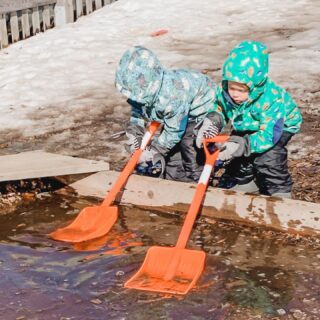 Our toddlers enjoy this wet spring weather too! We overheard one child say, “This is Lake Superior!” while playing in the puddle.